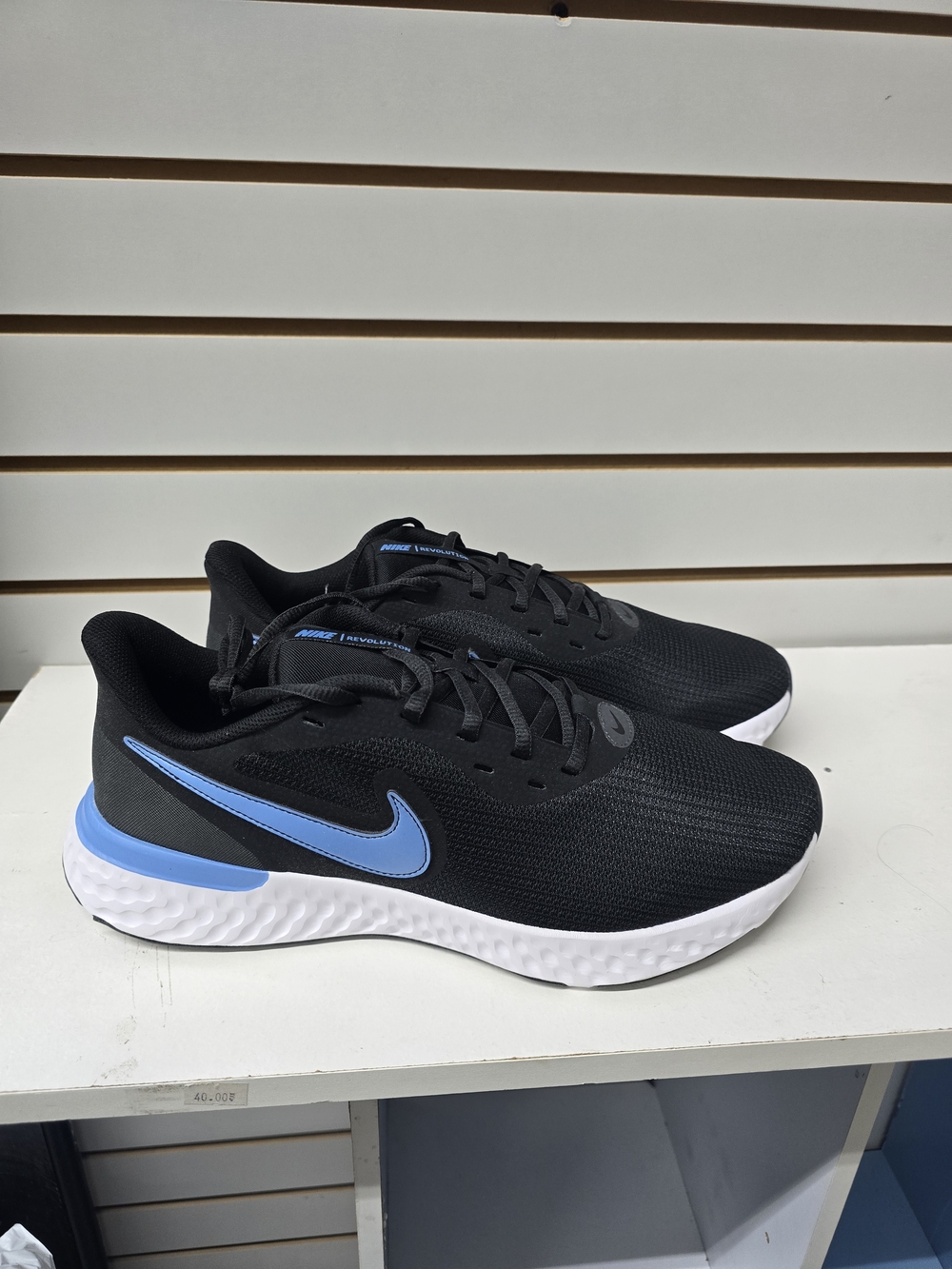 Nike Black Running Sneakers with Blue Swoosh